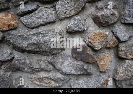 Old stone wall big rocks exterior pattern texture Stock Photo
