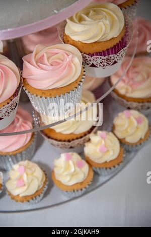 Cupcakes on a stand in the shape of a big cake for a Wedding reception Stock Photo