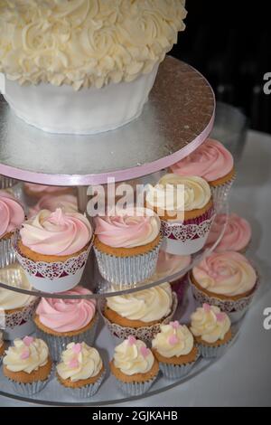 Cupcakes on a stand in the shape of a big cake for a Wedding reception Stock Photo