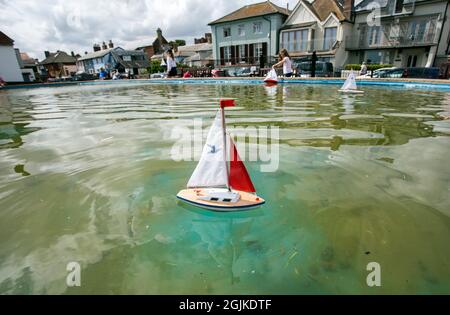 Aldeburgh, Suffolk, England, August 15th, 2021, model boats are sailed on a pond in the town Stock Photo