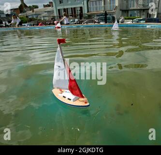 Aldeburgh, Suffolk, England, August 15th, 2021, model boats are sailed on a pond in the town Stock Photo