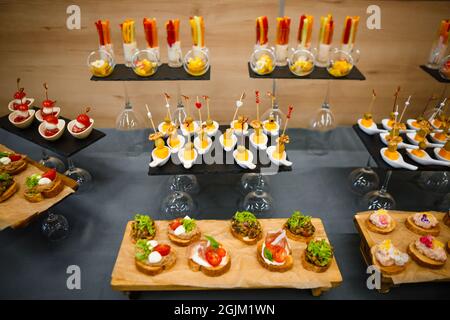 Catering service. Snacks for guests on the table. Stock Photo