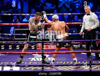 Sam Eggington (left) in action against Bilel Jkitou in the World Boxing Council Silver Middle Title during the boxing event at the Coventry Skydome Arena. Picture date: Friday September 10, 2021. Stock Photo