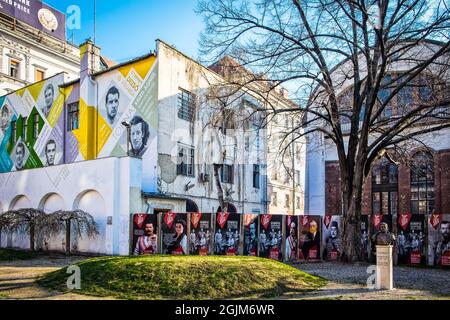 Hungary, Budapest, March 2020, view of a mural and posters in Varoshaza Park Stock Photo