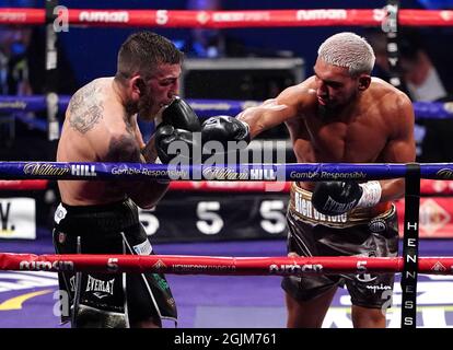 Sam Eggington (left) in action against Bilel Jkitou in the World Boxing Council Silver Middle Title during the boxing event at the Coventry Skydome Arena. Picture date: Friday September 10, 2021. Stock Photo