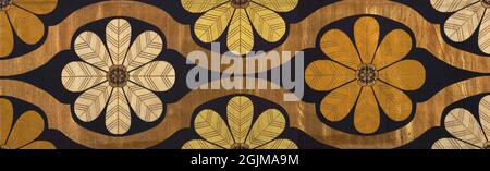 Japanese woven silk textile, possibly fabric for a coat. A dark blue twill weave with pattern of opposing curves (known as tate-waku),  framing large open flower heads. Japan Stock Photo
