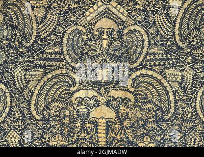 Detail of an Indonesian head cloth ('kain kepala') with symmetrical 'mirong' motifs (wings of Garuda) on a background with crayfish, birds and other motifs. Indonesia Stock Photo