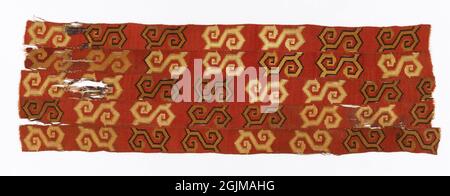 Precolumbian Peruvian textile fragment. Five tapestry-woven strips stitched together with highly stylised snake design in light and dark brown on a red background. Stock Photo