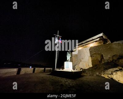 The sculpture of captain Andreas Miaoulis made of cooper over the port of Hydra island in Greece Stock Photo