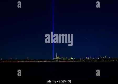 View on the Lower Manhattan with the Tribute in Light, from the Coney Island, Brooklyn on the eve of the 20th anniversary of the 9/11; Septemer 10, 20 Stock Photo