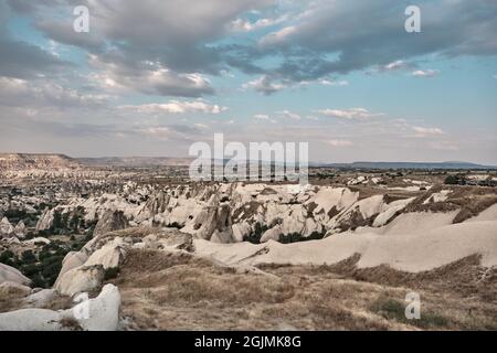 Panoramic view near Uchisar, Cappadocia with magnificent geological natural with blue sky Stock Photo