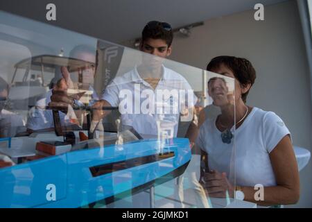 Annick Girardin is seen in front of the new model of a French boatbuilder, during the festival.Annick Girardin (minister of the sea) inaugurated and visited the Cannes Yachting Festival. Canceled in 2020 because of the Coronavirus pandemic, it is the biggest 'boat show' in Europe. More than 560 new boats will be exhibited, of which nearly 150 will be world premieres. For the first time, a 'green' course is set up following the obligation voted by law to reserve 1% of the places in port for electric boats in French ports. Stock Photo