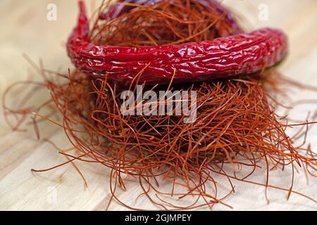 Chilli threads and chilli pod in a close-up Stock Photo