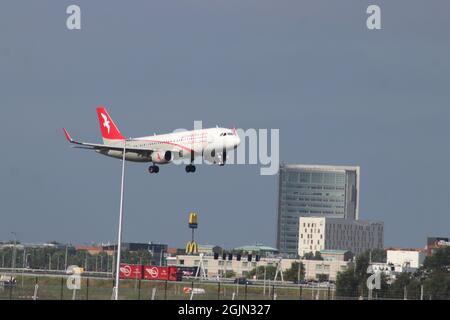 A6-AOJ Air Arabia Airbus A320 Aircraft is start to land on the Kaagbaan 06-24 at Amsterdam Schiphol Airport the Netherlands Stock Photo