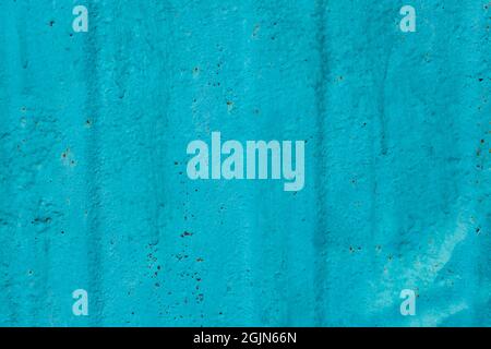 Cracked painted old metal texture. Abstract background of painted turquoise surface. Grunge blue wall background Stock Photo