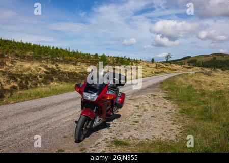 Honda ST1100 Pan European touring motorbike on the North Coast 500 route in the highlands of Scotland. Stock Photo