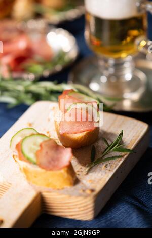 Sandwich with a thin slice of dry ham and cucumber Stock Photo