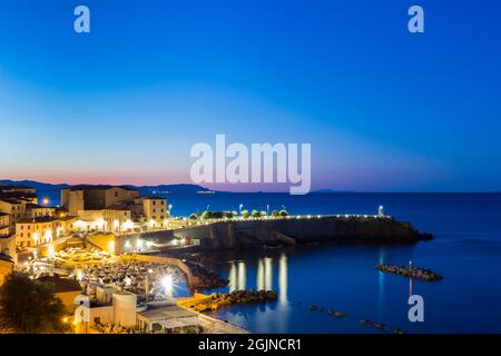 Piazza Bovio at sunrise, Piombino, Italy. It is the largest square surrounded by the sea in Europe Stock Photo