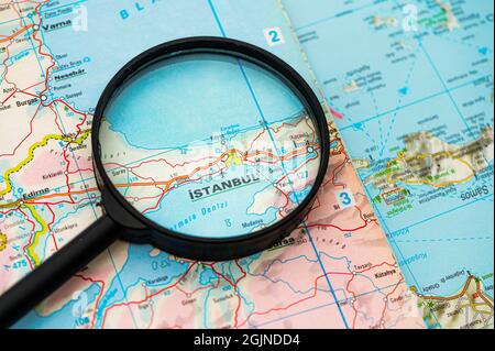 map of Istanbul in Turkey through magnifying glass, concept of planning the travel itinerary Stock Photo