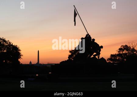 Arlington, Virginia, USA. 11th Sep, 2021. View of the Marine Corps War Memorial in the foreground of the Washington Monument on the morning of the 20th anniversary of 9/11 in Arlington, Virginia on September 11, 2021. Credit: Mpi34/Media Punch/Alamy Live News Stock Photo