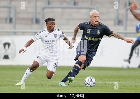 Eupen's Isaac Nuhu and Antwerp's Radja Nainggolan fight for the ball during a soccer match between KAS Eupen and Royal Antwerp FC, Saturday 11 Septemb Stock Photo