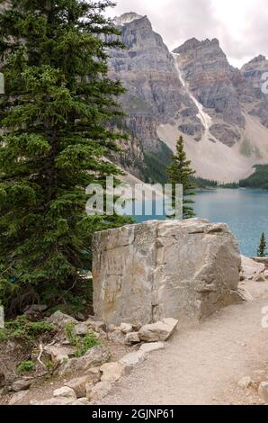 Moraine Lake in cloudy day in summer in Banff National Park, Alberta, Canada Stock Photo