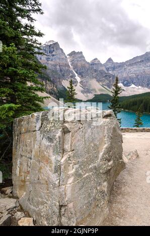 Moraine Lake in cloudy day in summer in Banff National Park, Alberta, Canada Stock Photo