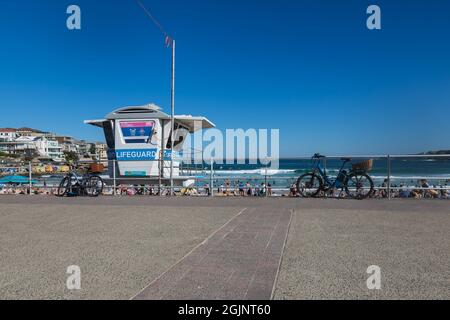 Sydney, Australia. Saturday11th September 2021. People relaxing on Bondi Beach as spring temperatures reach 27 degrees today. Covid-19 restrictions are set to ease on Monday for people in certain parts of Sydney who are fully vaccinated. Up to five people will be allowed to gather outside. Credit: Paul Lovelace/Alamy Live News Stock Photo