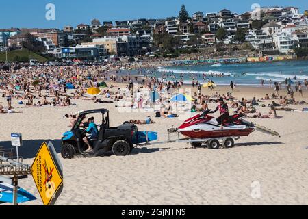 Sydney, Australia. Saturday11th September 2021. People relaxing on Bondi Beach as spring temperatures reach 27 degrees today. Covid-19 restrictions are set to ease on Monday for people in certain parts of Sydney who are fully vaccinated. Up to five people will be allowed to gather outside.. Credit: Paul Lovelace/Alamy Live News Stock Photo