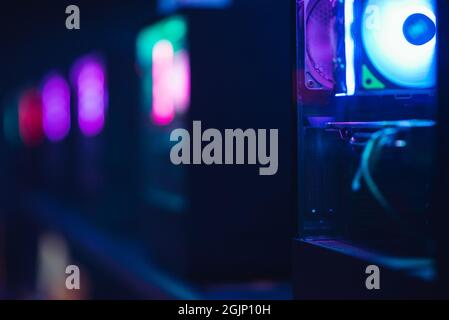 Dark computer rooms with many rgb rigs in a row Stock Photo