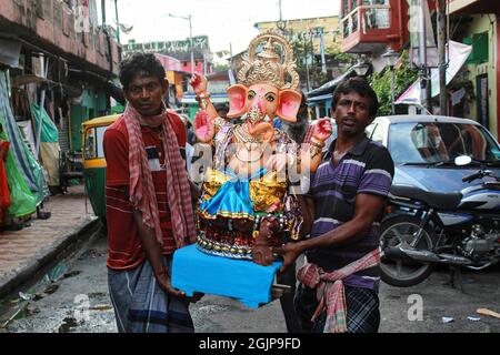 Kolkata, India. 09th Sep, 2021. The home coming of Lord Ganesha is happening today at Kumortuli in Kolkata. This year Ganesh Chaturthi 2021 will be celebrated on Friday, 10 September 2021. Ganesh Chaturdashi, also called as Vinayak Chaturdashi, is an important Hindu festival. Ganesh Chaturdashi marks the birth anniversary of Lord Ganesha who is the son of Lord Shiva, and Goddess Parvati. Lord Ganesh is the symbol of education, wisdom, good fortune and prosperity. (Photo by Snehasish Bodhak/Pacific Press/Sipa USA) Credit: Sipa USA/Alamy Live News Stock Photo