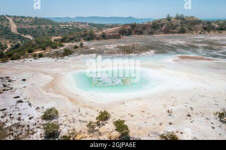 Open pit of old copper mine with dried polluted lake bed in Limni, Cyprus. Aerial landscape Stock Photo