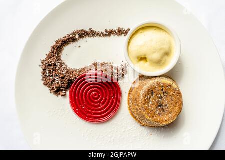 Lava cake or molten chocolate cake served on white plate Stock Photo