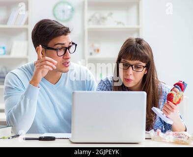 The two medical students studying in classroom Stock Photo