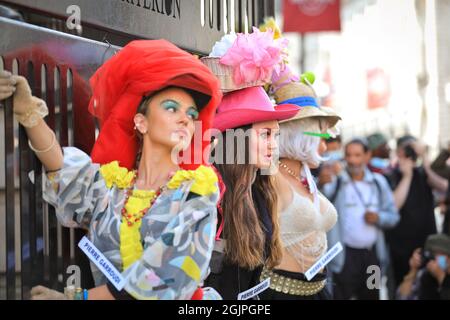 London, UK. 11th Sep, 2021. Models pose in extravagant outfits and accessories at a flashmob street fashion show for designer Pierre Garroudi in the streets of central London. Credit: Imageplotter/Alamy Live News
