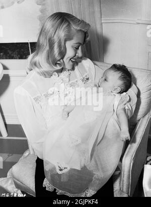 Lana Turner, with her newborn daughter Cheryl Crane, 1943 / File Reference # 34145-458THA Stock Photo