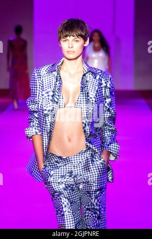 A model walks the runway at the Brandon Maxwell spring/summer 2022 fashion  show in the Brooklyn borough of New York during Fashion Week on Friday,  Sept. 10, 2021. (Photo by Evan Agostini/Invision/AP