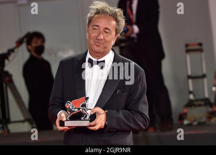 Venezia, Italien. 11th Sep, 2021. VENICE, ITALY - SEPTEMBER 11: Director Paolo Sorrentino poses with the Silver Lion Grand Jury Prize for 'The Hand Of God' at the awards winner photocall during the 78th Venice International Film Festival on September 11, 2021 in Venice, Italy Credit: dpa/Alamy Live News Stock Photo