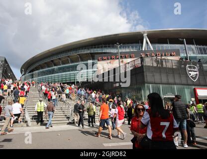 London, UK. 11th Sep, 2021. Fans arriving at the EPL match Arsenal v Norwich City, at the Emirates Stadium, London, UK on 11th September, 2021. Credit: Paul Marriott/Alamy Live News