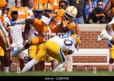 September 11, 2021: Tennessee Volunteers wide receiver Velus Jones Jr. #1 runs the ball and is tackled by Pittsburgh Panthers defensive lineman Deandre Jules #90 during the NCAA football game between the University of Tennessee Volunteers and the University of Pittsburgh Panthers at Neyland Stadium in Knoxville TN Tim Gangloff/CSM Stock Photo