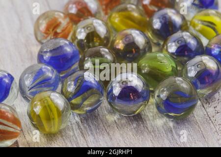 scattered colored glasses marbles Stock Photo