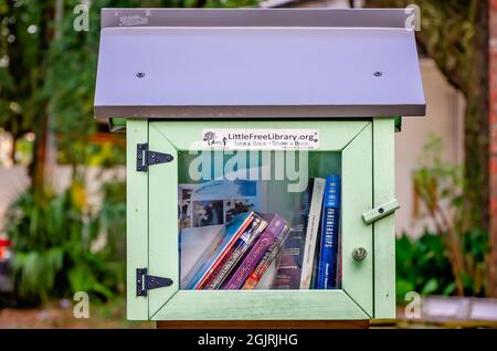 A Little Free Library stands on Rue Magnolia, Sept. 5, 2021, in Biloxi, Mississippi. Little Free Libraries are part of a free, public book exchange. Stock Photo