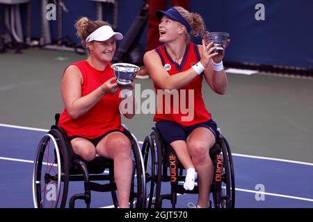 New York City, United States. 11th Sep, 2021. Flushing Meadows, New York - September 11, 2021: New York: Diede de Groot, and Aniek van Koot of the Netherlands with their trophies after winning the Wheelchair women's doubles final against Yui Kamiji of Japan and Jordane Whiley of Great Britain today at the 2021 US Open in Flushing Meadows, New York. Credit: Adam Stoltman/Alamy Live News Stock Photo