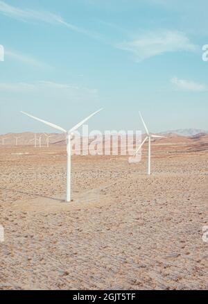 Windmill Farm in California desert, vertical image.  Stock Photo