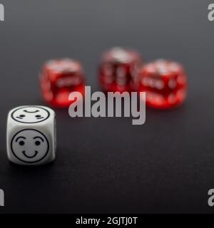 colorful dice on dark background Stock Photo