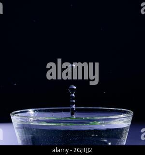 water droplet in dark background Stock Photo