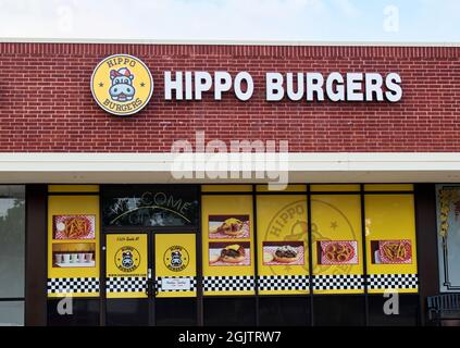 Humble, Texas USA 08-14-2019: Hippo Burgers storefront in Humble, TX. Store chain was established in 2014 and has only a few locations in Texas. Stock Photo