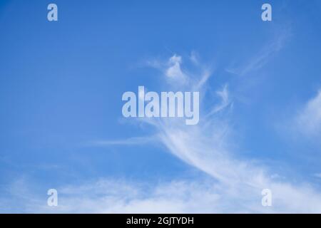Cirrostratus cloud in the shape of a skeletal hand Stock Photo