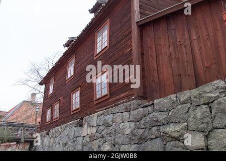 Stockholm, Sweden - December 29 04 2018: exterior view of traditional furniture workshop wooden building painted in falun red in Skansen Open-Air Muse Stock Photo