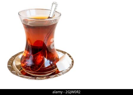 Traditional turkish tea with sugar cubes on white background Stock Photo
